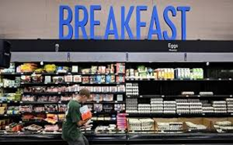 Quan chức Fed cảnh báo giá cả tăng do thuế nhập khẩu. Ảnh: AFP