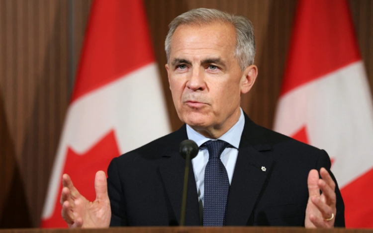 Canada tính đầu tư vào dự án Vòm Vàng của ông Trump trị giá 175 tỷ USD. Thủ tướng Canada Mark Carney tại cuộc họp báo ở Ottawa ngày 21/5. Ảnh: AFP